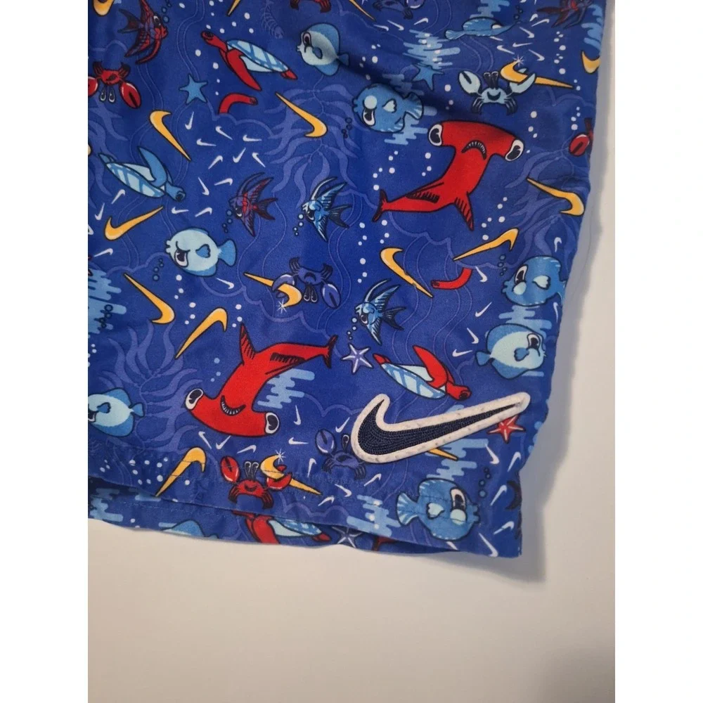 Nike Boys Medium 10-12 Swim Trunks Blue Shark Fish Print Mesh Lined Swoosh
